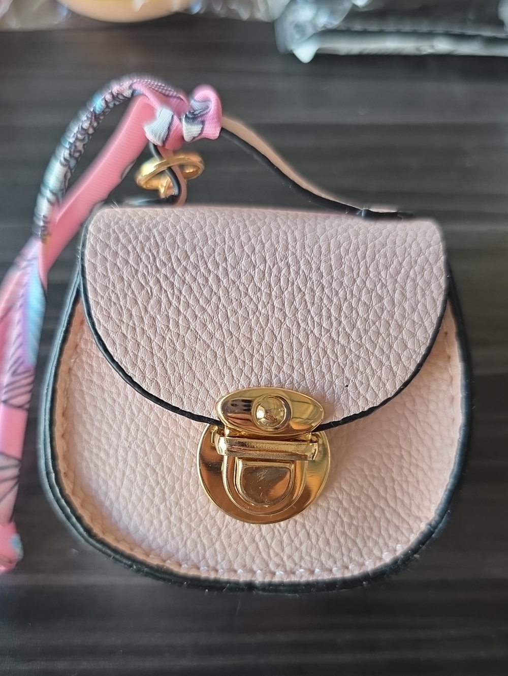 Elegant Pink Leather Crossbody Bag with Gold Hardware